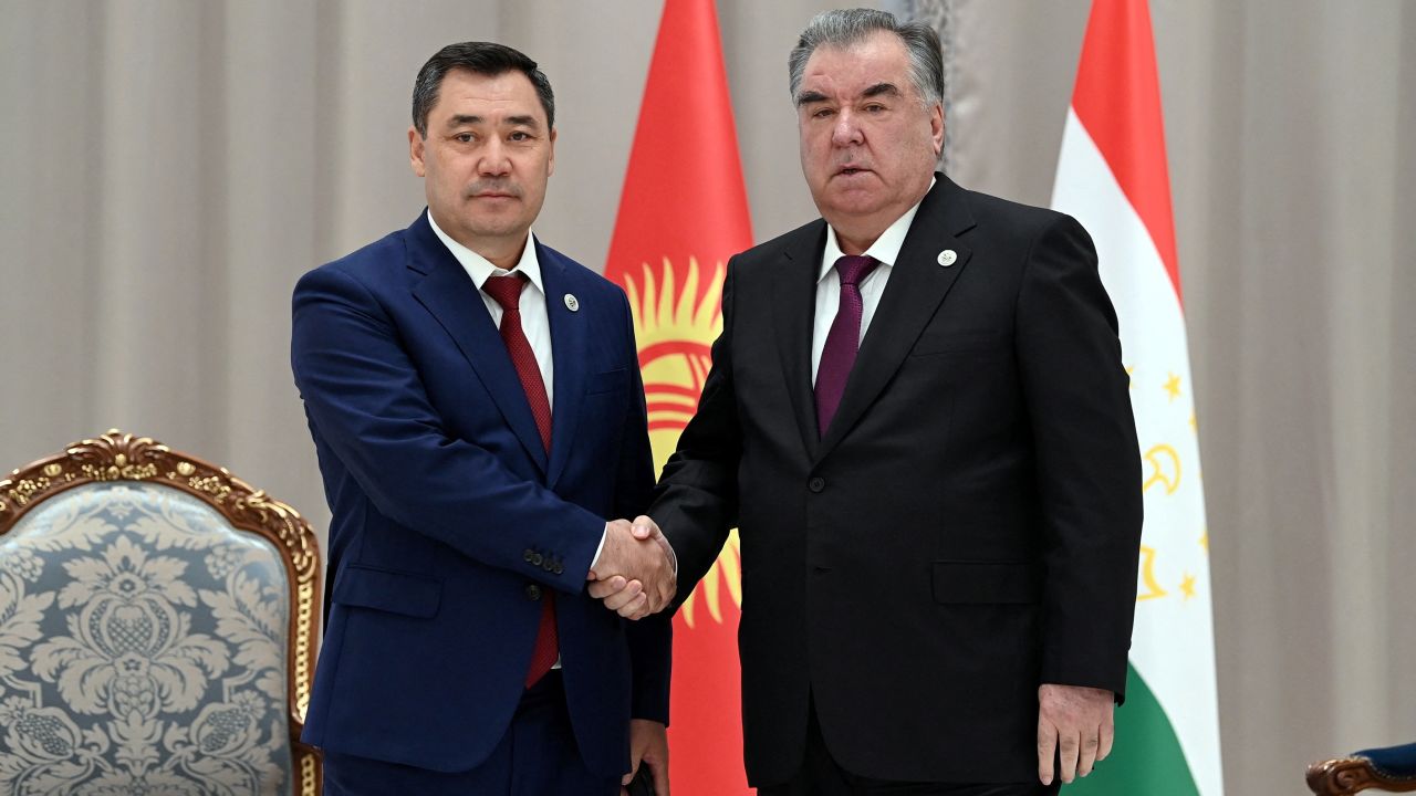 Kyrgyz President Sadyr Japarov shakes hands with Tajik President Emomali Rakhmon during a meeting on the sidelines of the Shanghai Cooperation Organization (SCO) summit in Samarkand, Uzbekistan September 16, 2022. 