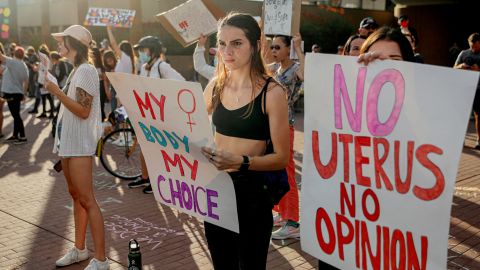 Abortion rights protesters chant during a rally at the Tucson Federal Courthouse in Tucson, Arizona, on Monday, July 4, 2022. 