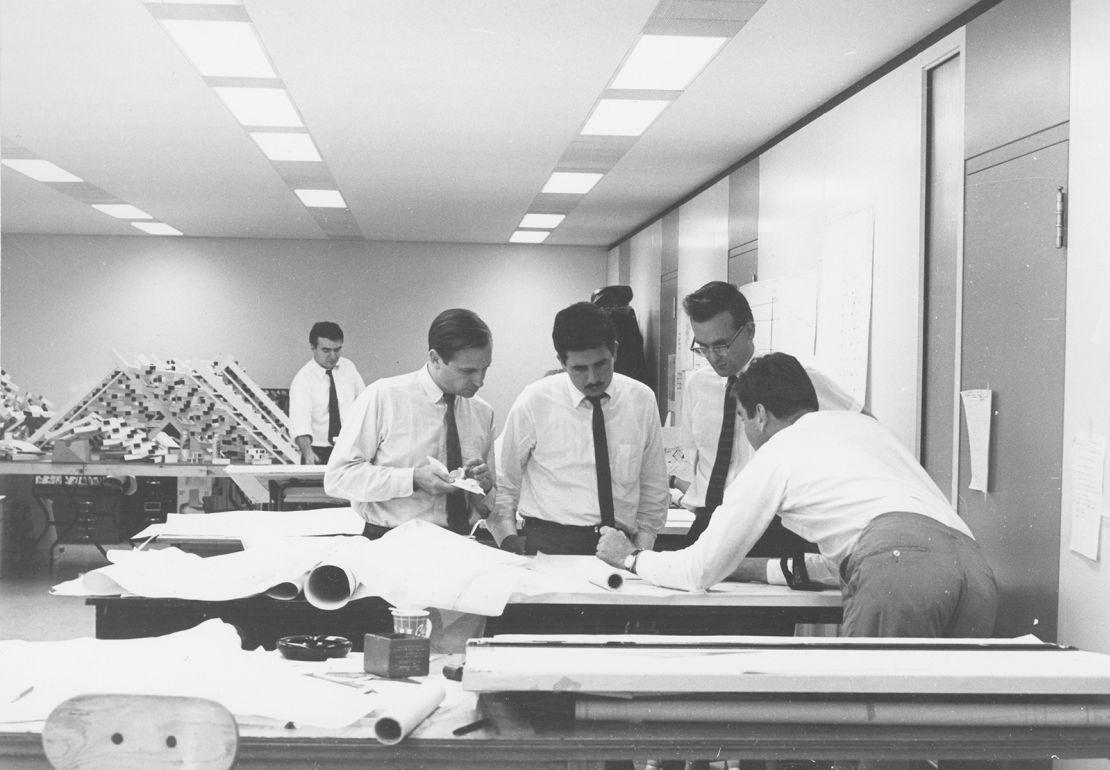 Safdie, third from right, working on Habitat 67 at Montreal's Place Ville-Marie in 1964.