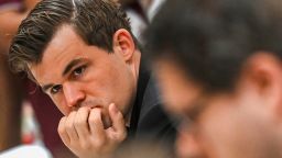 FIDE reprimands Magnus Carlsen for quitting match after one move but  'shares his deep concerns' about cheating in chess