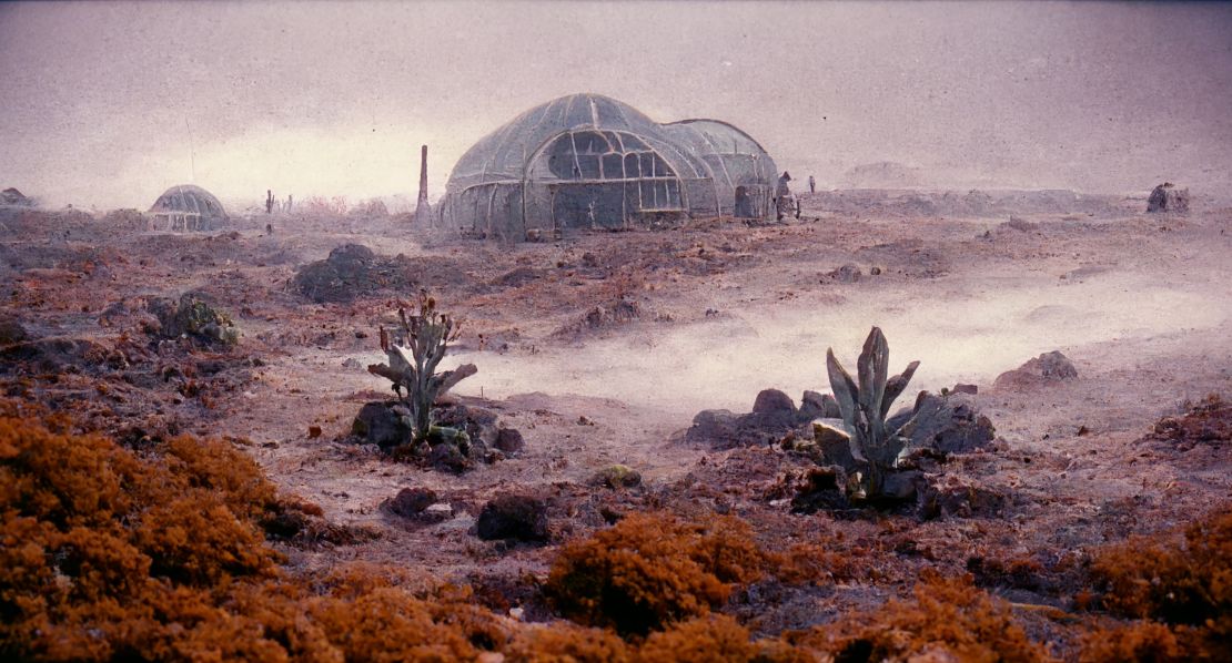 For this "Salt" image, Stelzer, used Midjourney with the prompt "film still of a research station on a mining planet, sci-fi atmosphere, beige and dark, 1980s sci-fi movie, tense atmosphere, rare alien plants and vegetation, arid, dusty, fog."