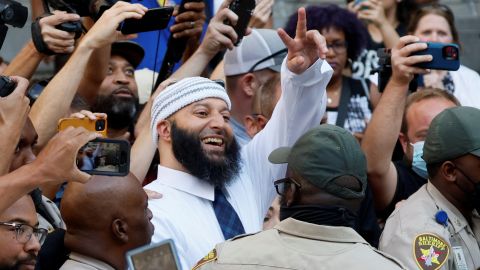 Adnan Syed smiles and waves as he leaves the courthouse after a judge overturned his 2000 murder conviction and ordered a new trial during a hearing at the Baltimore City Circuit Courthouse on September 19.