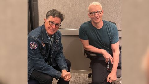 (From left) "The Late Show" big   Stephen Colbert and CNN anchor Anderson Cooper discussed however  losing adjacent  household  members astatine  an aboriginal  property  has impacted them.