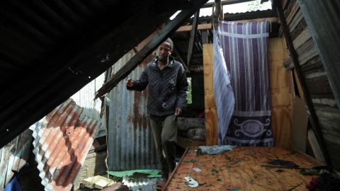 A man looks at his house in the aftermath of Hurricane Fiona in El Seibo, Dominican Republic.