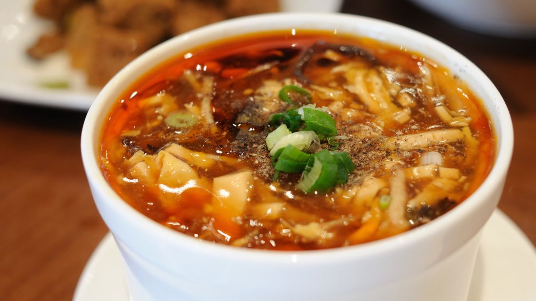 <strong>Hot and sour soup: </strong>A bowl of hot and sour soup should have a balance of sourness (from vinegar) and spiciness (from peppers). Shreds of tofu, Chinese mushrooms, wood ears and bamboo shoots are some of the common ingredients found in this thick soup.