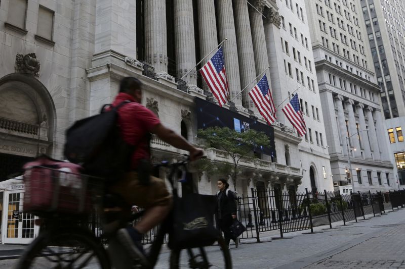 Dow falls below 30,000 points