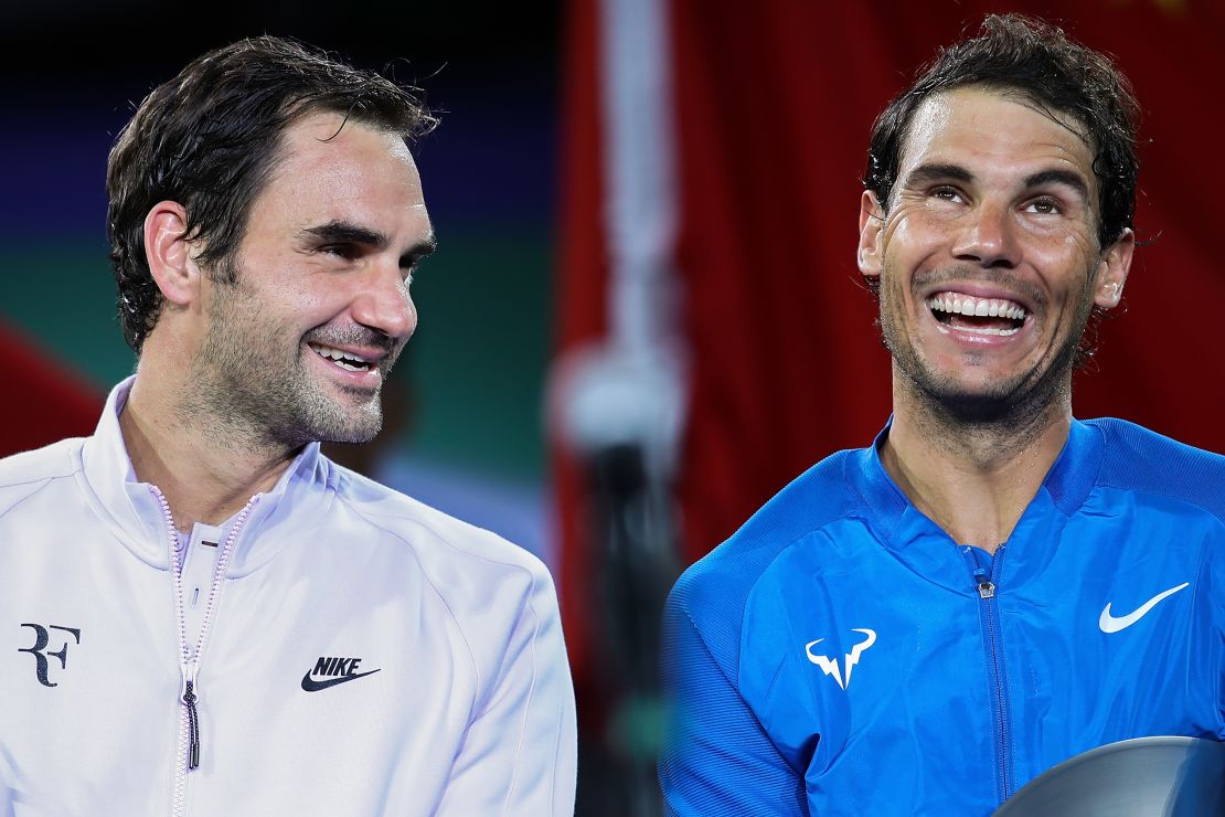 Federer (left) and Nadal laugh together following a match in Shanghai in 2017. 