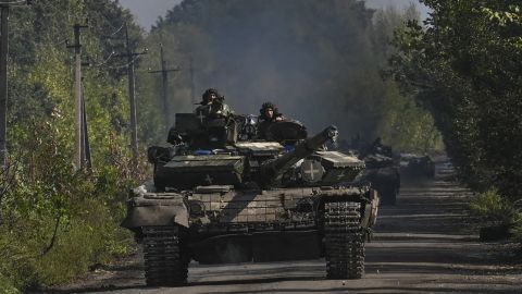 Ukrainian soldiers ride a tank in Novosilivka, Ukraine, on September 17, 2022. 