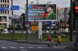 A billboard promoting contract army service, with the slogan "Serving Russia is a real job," in St. Petersburg.