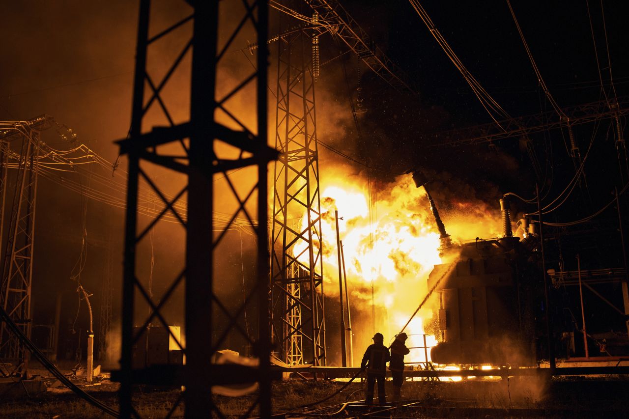 Ukrainian State Emergency Service firefighters put out a fire after a Russian rocket attack hit an electric power station in Kharkiv, Ukraine, on September 11.