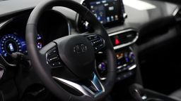 The interior of a Hyundai Motor Co. Santa Fe sport utility vehicle (SUV) is seen during a launch event for the updated vehicle in Goyang, South Korea, on Wednesday, Feb. 21, 2018. To recapture buyers in the U.S. who have shunned its sedans and compact cars, Hyundai has said it will bring eight new or redesigned crossovers or SUVs by 2020. Photographer: SeongJoon Cho/Bloomberg via Getty Images