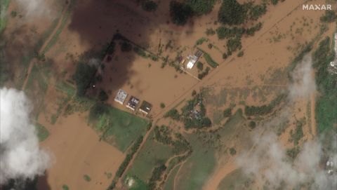 Ruinous Hurricane Fiona Reaches Category 4 As It Moves North, Leaving Disaster-Stricken Areas On Slow Road To Recovery | CNN 4 A satellite image shows flooded fields and buildings in Cerrillos, Puerto Rico, on Tuesday.