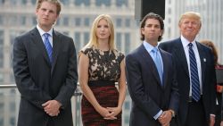 Real estate developer Donald Trump (R) and his children (L-R) Eric, Ivanka, and Donald Jr., attend a press conference at the Trump International Hotel and Tower in Chicago on September 24, 2008. Trump's 1,360-foot (414.5-meter), 92-story tower is expected to be finished in six months and will stand as the second-tallest building in Chicago, after the Sears Tower.     AFP PHOTO/Amanda Rivkin (Photo credit should read Amanda Rivkin/AFP via Getty Images)