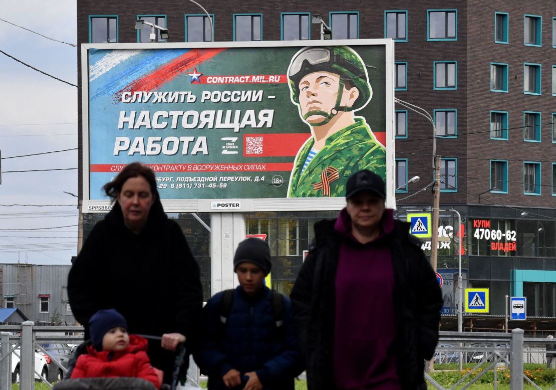 A billboard promoting army service in Saint Petersburg on September 20 contains the slogan, "Serving Russia is a real job." 