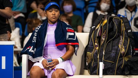TOKYO, JAPAN - SEPTEMBER 20: Naomi Osaka of Japan watches on as  opponent Daria Saville of Australia receives medical treatment after Saville took a fall early into their first round match on Day 2 of the Toray Pan Pacific Open at Ariake Coliseum on September 20, 2022 in Tokyo, Japan (Photo by Robert Prange/Getty Images)