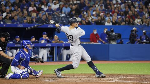 Aaron Judge hits an RBI double against the Toronto Blue Jays at Rogers Centre on May 3 in Canada.