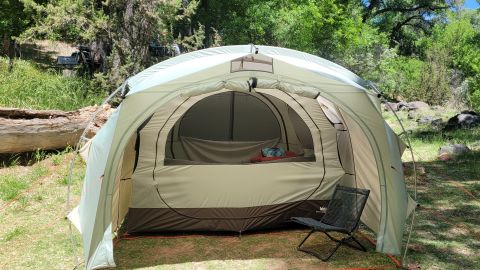 Large vestibule of Wonderland X tent with camp chair underneath