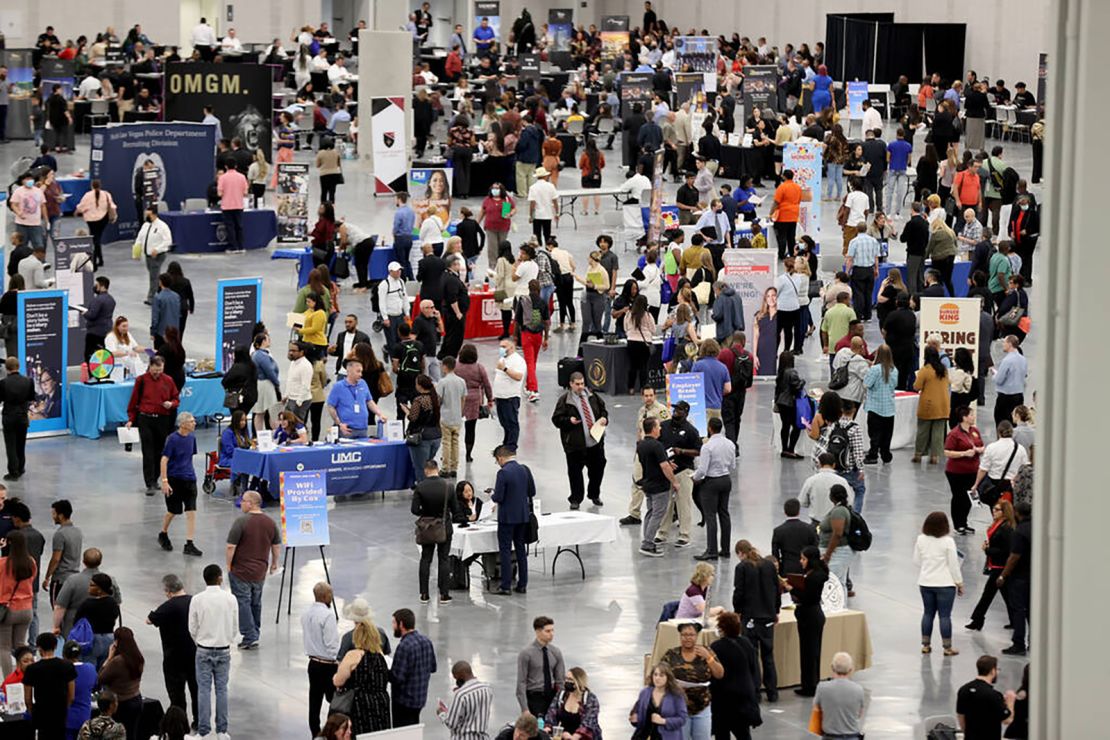 Job seekers visit booths during the Spring Job Fair at the Las Vegas Convention Center.