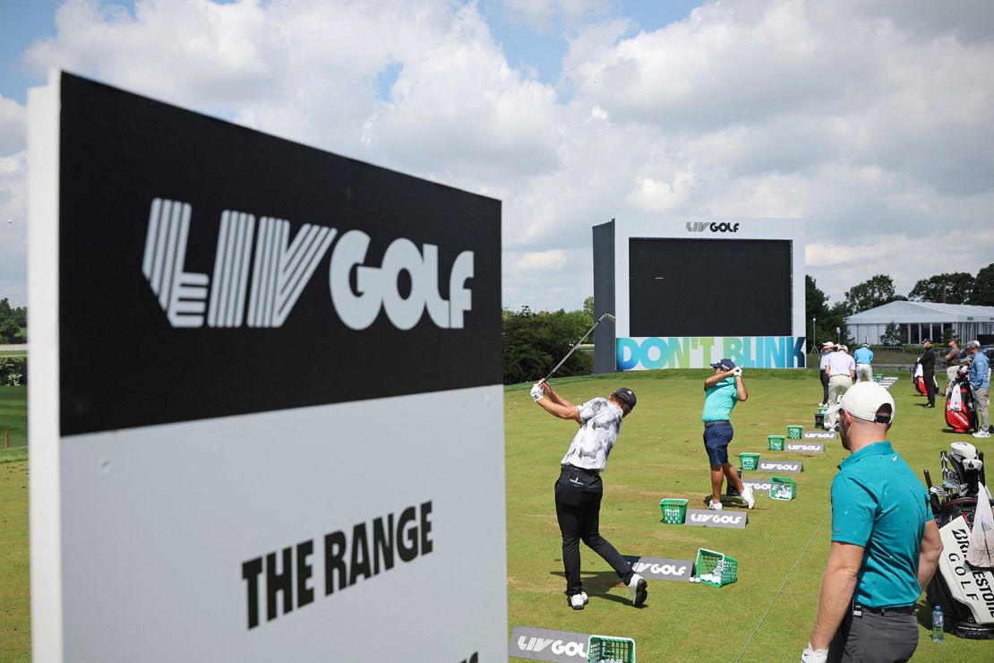 Players practice on the driving range ahead of the LIV Golf event in St. Albans, England, in June. 