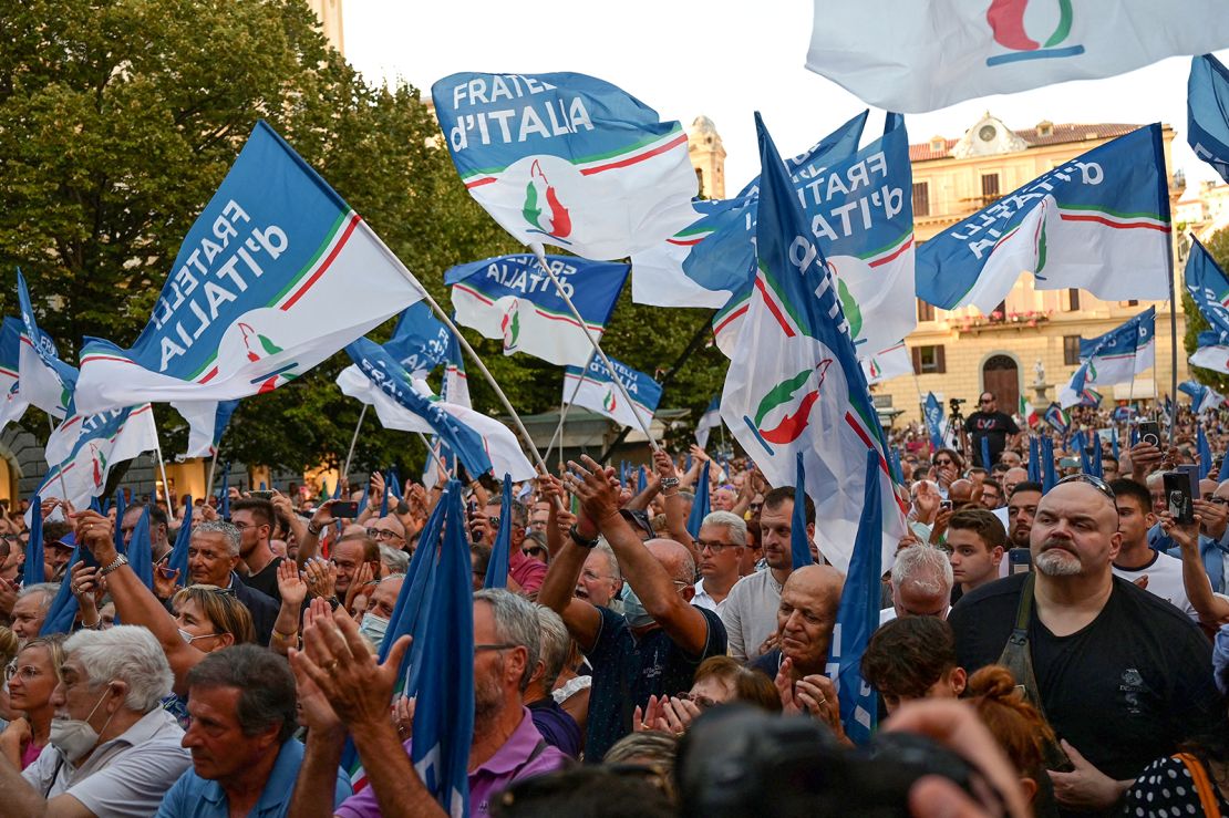 Party supporters attend a campaign rally for Giorgia Meloni in Ancona, central Italy, on August 23, 2022. 