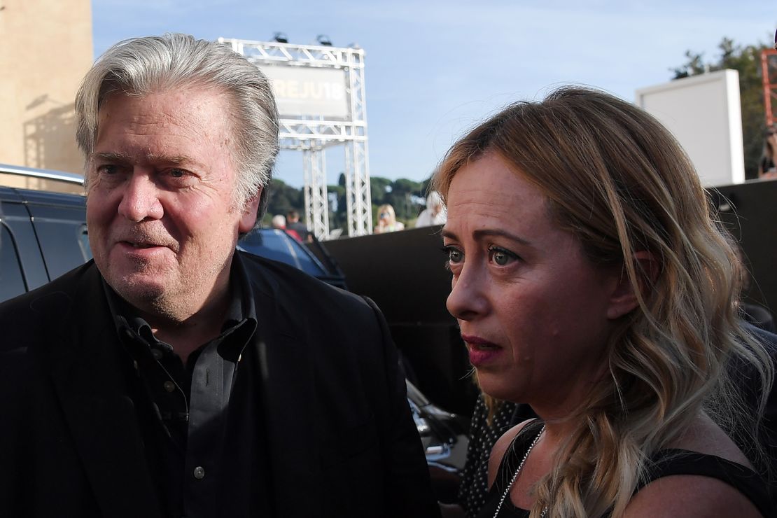 Former Trump White House chief strategist Steve Bannon (left) arrives with Giorgia Meloni to attend a congress of the Brothers of Italy party in Rome on September 22, 2018.