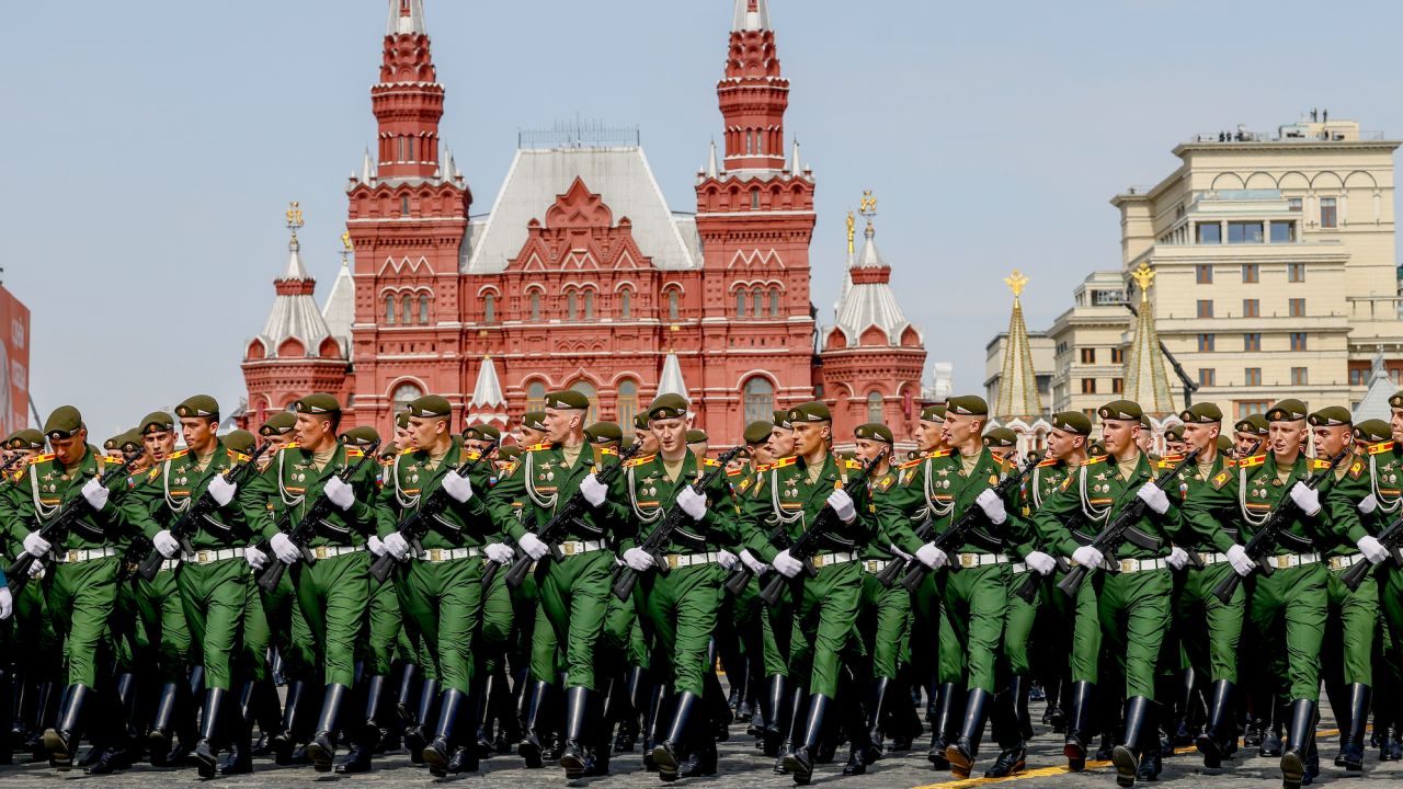 Russian soldiers walk to Red Square during a rehearsal on May 7 for a military parade marking the 77th anniversary of the victory over Nazi Germany in World War II.