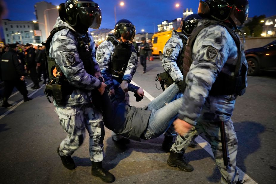 Police detain a protester in Moscow on Wednesday, September 21. <a href="https://www.cnn.com/2022/09/22/europe/russia-protests-partial-mobilization-ukraine-intl-hnk/index.html" target="_blank">More than 1,300 people were detained across Russia</a> for participating in anti-war protests after leader Vladimir Putin announced a "partial mobilization" of citizens for his faltering invasion of Ukraine.