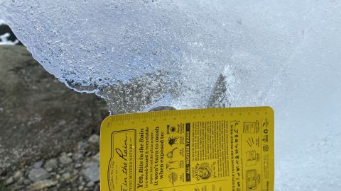 A closeup of an iceberg shows its high density of air bubbles.