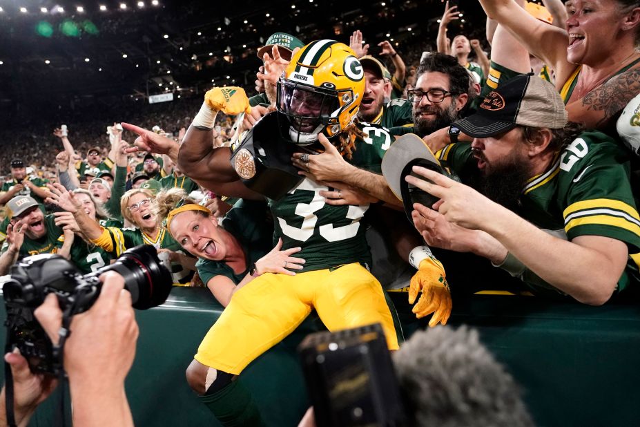 Green Bay running back Aaron Jones celebrates with fans after scoring a touchdown against Chicago on Sunday, September 18. <a href="http://www.cnn.com/2022/09/12/sport/gallery/nfl-2022-season/index.html" target="_blank">See more photos from Week 2 in the NFL.</a>