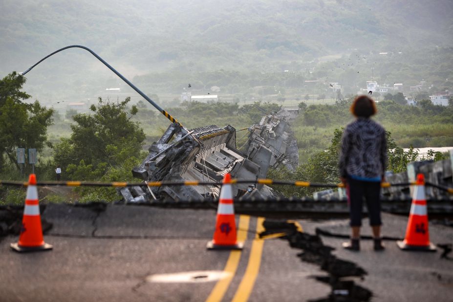 A local surveys a collapsed bridge after a <a href="https://www.cnn.com/2022/09/18/asia/taiwan-earthquake-tsunami-warnings-intl/index.html" target="_blank">6.9 magnitude earthquake</a> hit southeastern Taiwan on Sunday, September 18.
