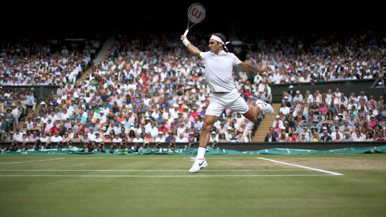Roger Federer hits a backhand during the Wimbledon final in 2017.
