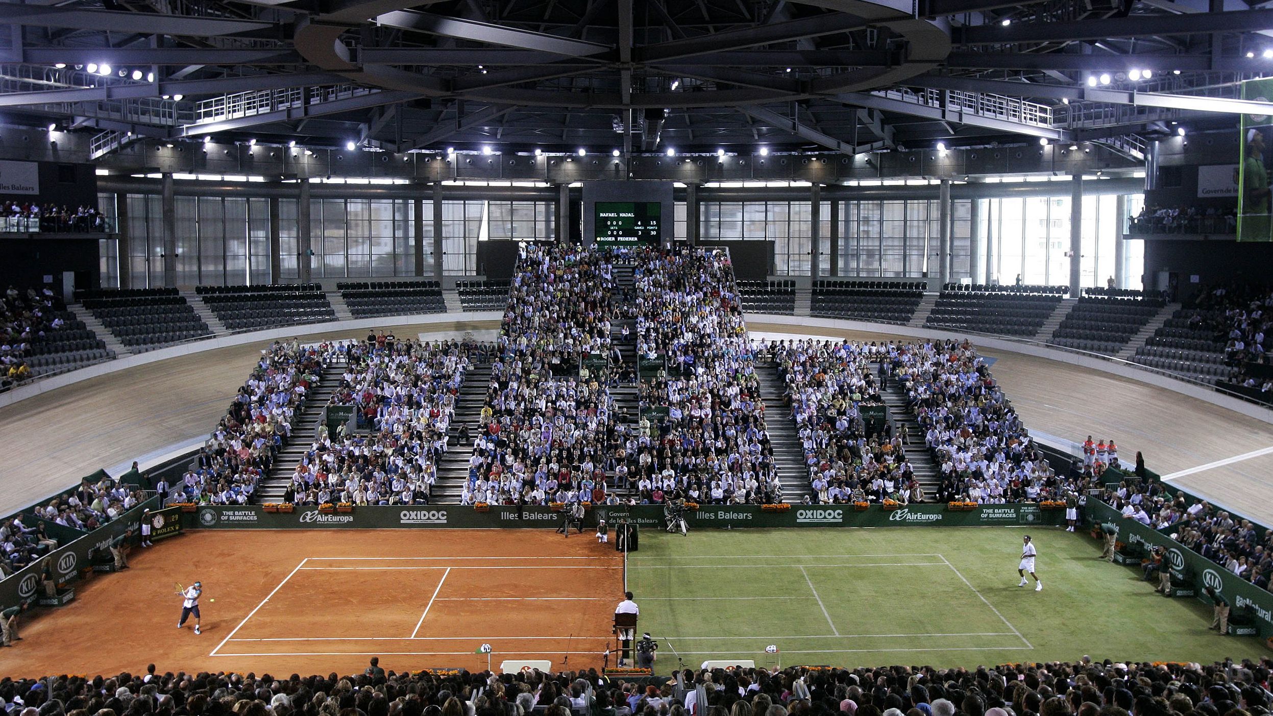 Federer and Rafael Nadal play an exhibition on a half-clay, half-grass match in Spain in 2007. Federer has excelled on grass his entire career. Nadal is widely known as the "King of Clay."