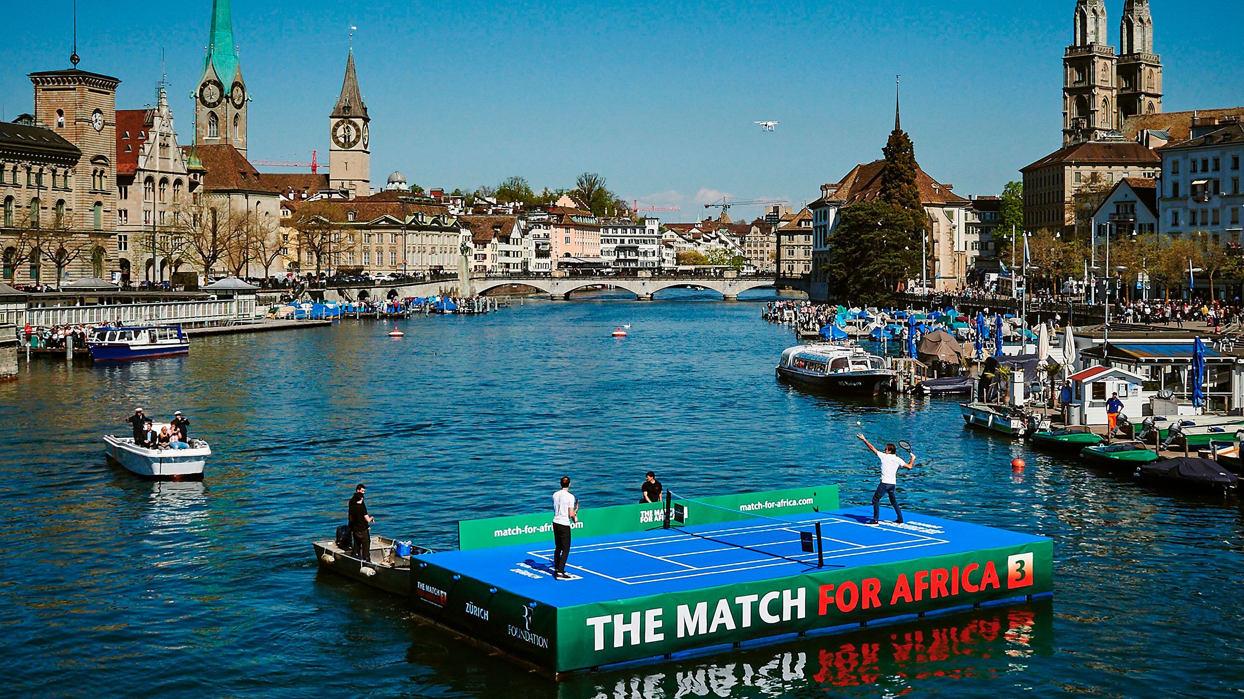 Federer and Murray play a charity match on a raft in Zurich, Switzerland, in 2017.