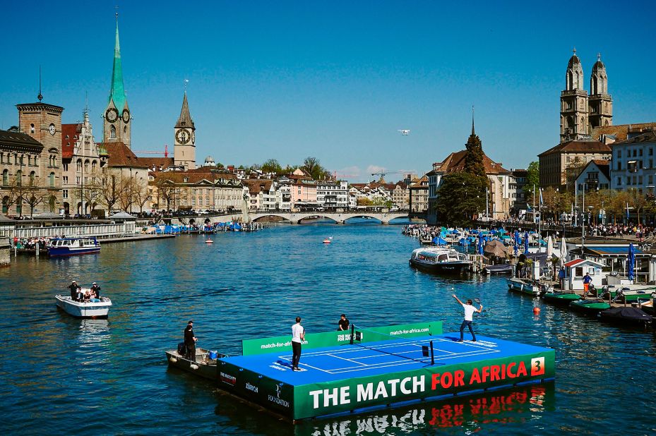 Federer and Murray play a charity match on a raft in Zurich, Switzerland, in 2017.