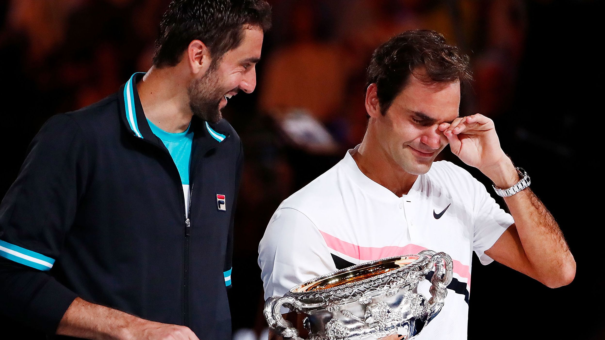 Federer tears up next to Martin Cilic after winning the 2018 Australian Open. It was the last grand slam title of his career.