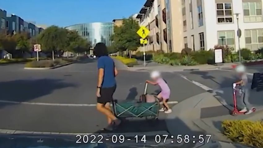 child narrowly avoids suv