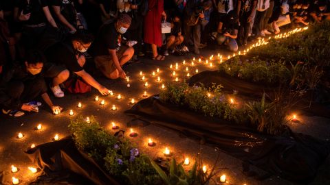 Candles are lit as part of an art installation during an event commemorating the 50th anniversary of martial law declaration by late dictator Ferdinand Marcos,.
