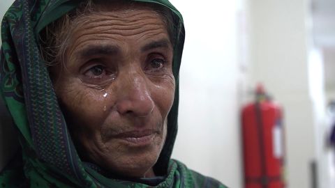 Mai Sabagi weeps after she learns of her grandaughter's death. 