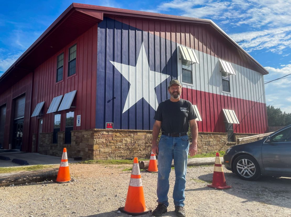 Waldron poses for a photo at his distillery, One Shot Distillery and Brewery, in Dripping Springs, Texas, U.S., December 2, 2021. 