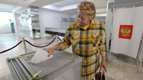 A woman casts her ballot in Sevastopol, Crimea, on September 23, 2022.