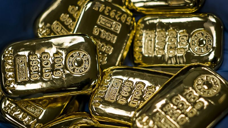Premarket stocks: The curious case of falling gold prices | CNN ...