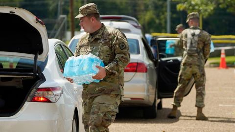 Mississippi National Guardsmen helped distribute water after the city's system partially failed.