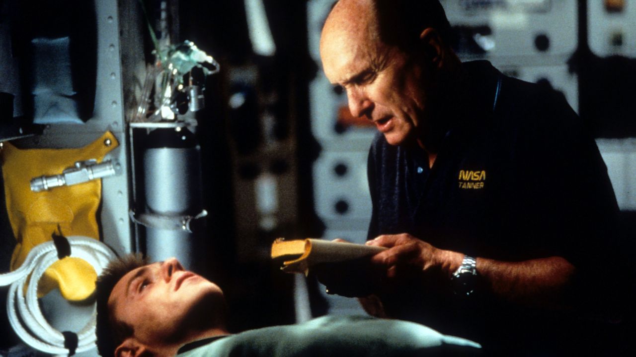 Robert Duvall, right, with Ron Eldard, commands a spaceship trying to plant nukes on a comet in "Deep Impact" (1998),
