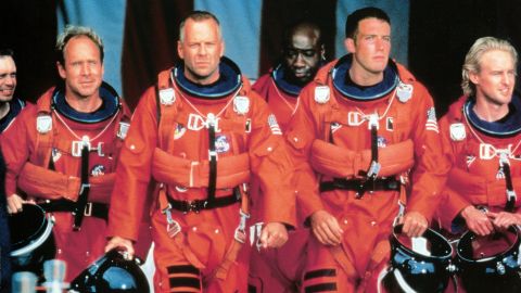 Bruce Willis, center, leads an oil rig crew, including Ben Affleck, second from right, to blow up an asteroid before it hits Earth in the 1998 disaster movie "Armageddon."