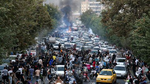 Dozens of people stage a demonstration to protest the death of a 22-year-old woman under custody in Tehran Iran on September 21, 2022. 