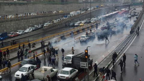 People protest against the increase in gasoline prices on a highway in Tehran, Iran November 16, 2019. 