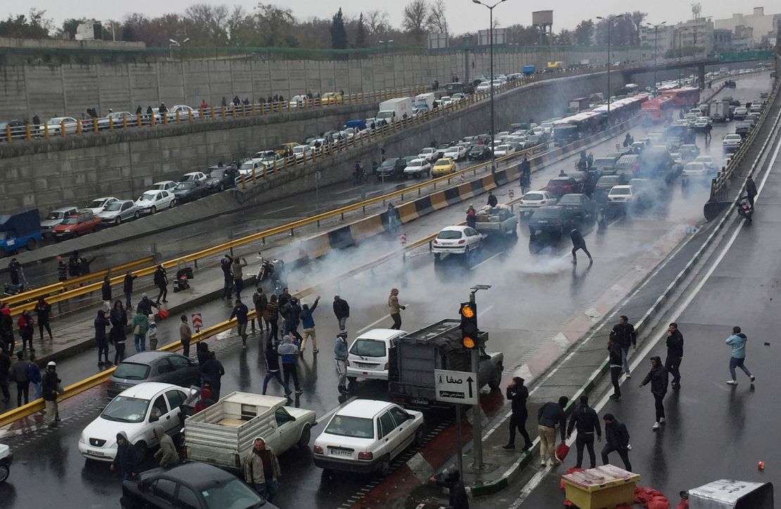 People protest against increased gas price, on a highway in Tehran, Iran November 16, 2019. 