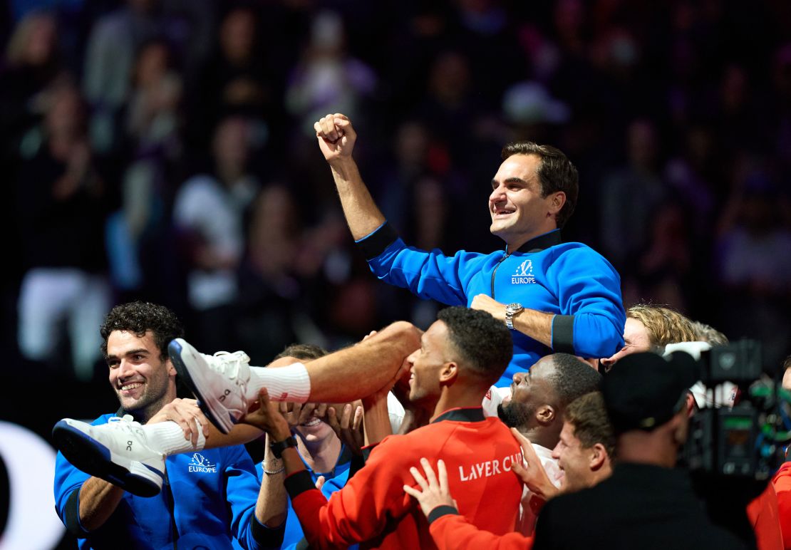 Roger Federer is hoisted after his Laver Cup Tennis match. 