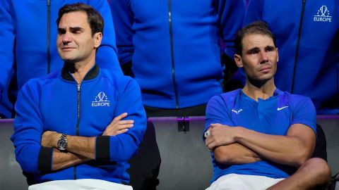 An emotional Roger Federer, left, of Team Europe sits alongside his playing partner Rafael Nadal after their Laver Cup doubles match against Team World's Jack Sock and Frances Tiafoe at the O2 arena in London, Friday, Sept. 23, 2022. Federer's losing doubles match with Nadal marked the end of an illustrious career that included 20 Grand Slam titles and a role as a statesman for tennis. (AP Photo/Kin Cheung)
