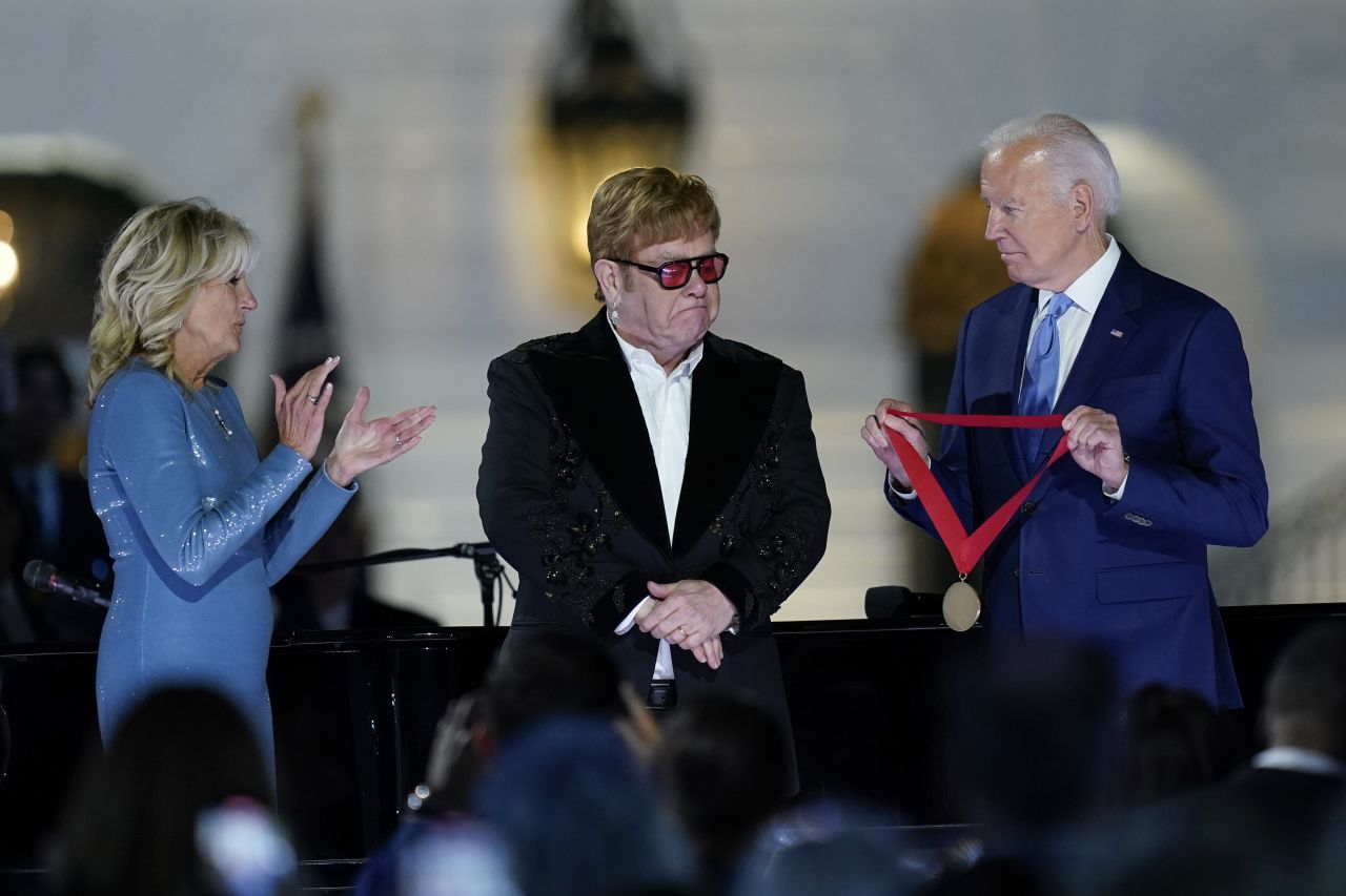 US President Joe Biden, joined by first lady Jill Biden, <a href="https://www.cnn.com/2022/09/23/politics/elton-john-humanities-medal-white-house-performance-biden/index.html" target="_blank">presents John with the National Humanities Medal</a> after a concert on the South Lawn of the White House in September 2022. The medal, according to the presentation, was to honor John "for moving our souls with his powerful voice and one of the defining song books of all time. An enduring icon and advocate with absolute courage, who found purpose to challenge convention, shatter stigma and advance the simple truth — that everyone deserves to be treated with dignity and respect."